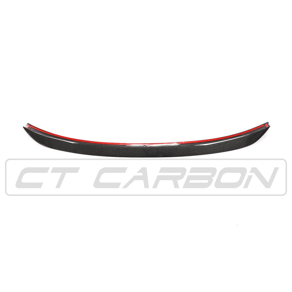 BMW F10 M5 carbon fiber spoiler by CT Carbon, showcasing aerodynamic V-style design on a sleek black sports car.