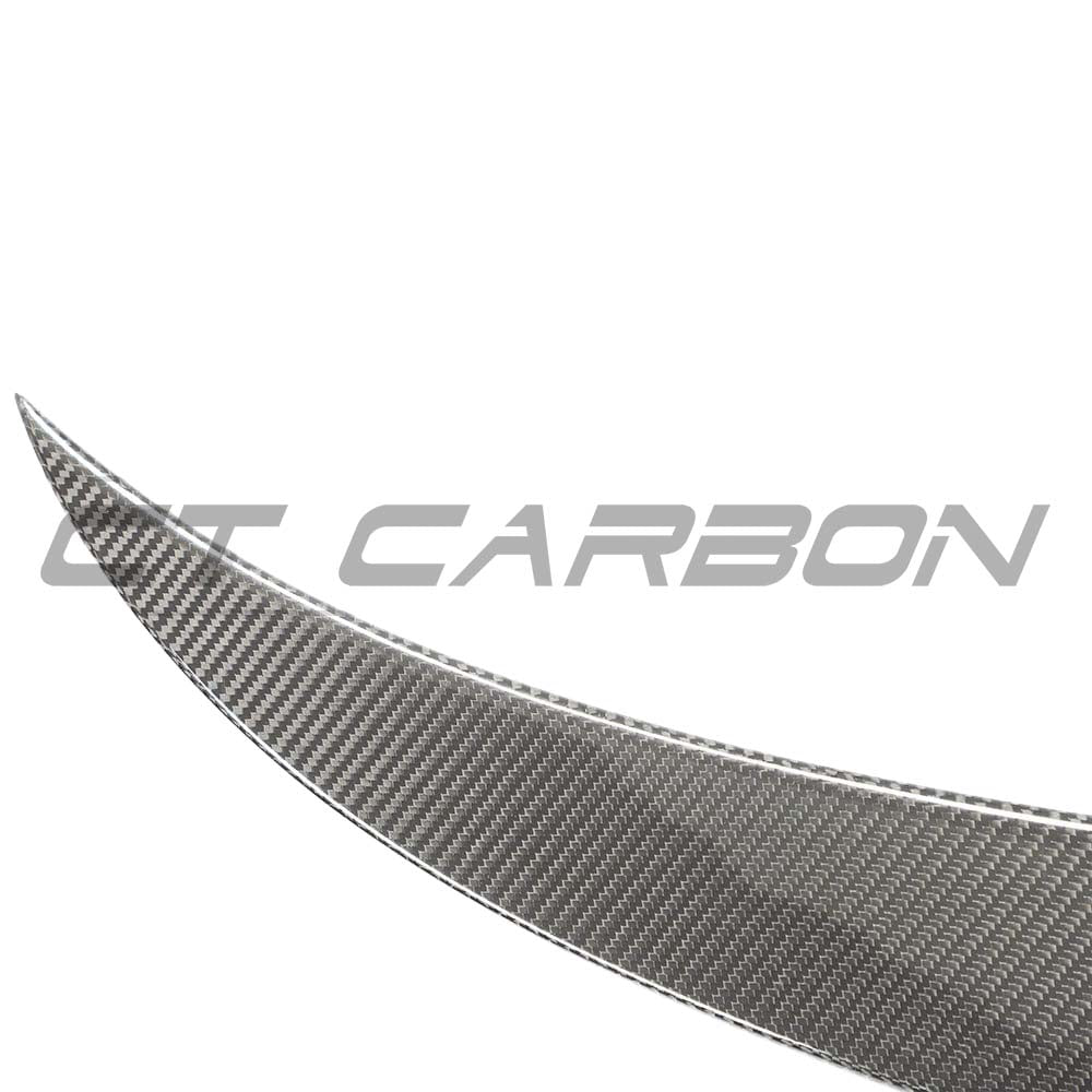 BMW G23 4 Series Convertible 2020+ carbon fibre kit by CT Carbon, featuring a sleek carbon fibre spoiler and aerodynamic enhancements.