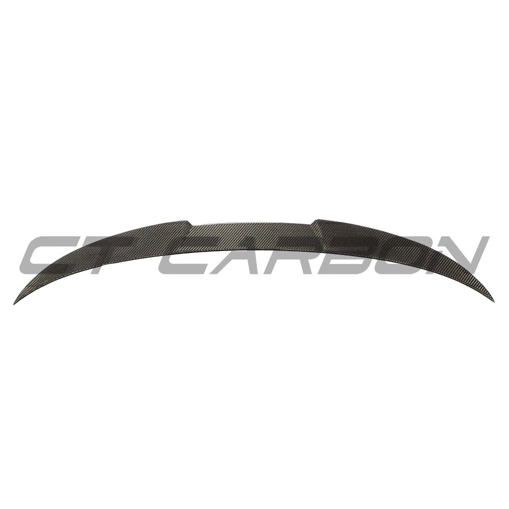 BMW G83 M4 full carbon fiber kit by CT Carbon, featuring a sleek carbon fiber spoiler and aerodynamic enhancements.