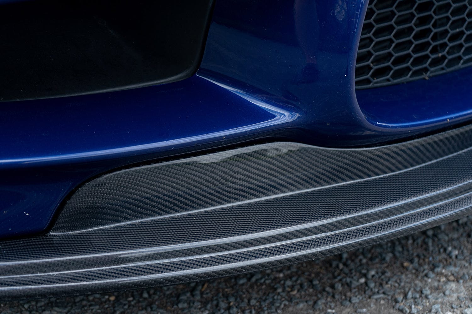 BMW M3 E92/E90 carbon fibre splitter by CT Carbon, GTS style, showcasing the sleek, lightweight aerodynamic car part.