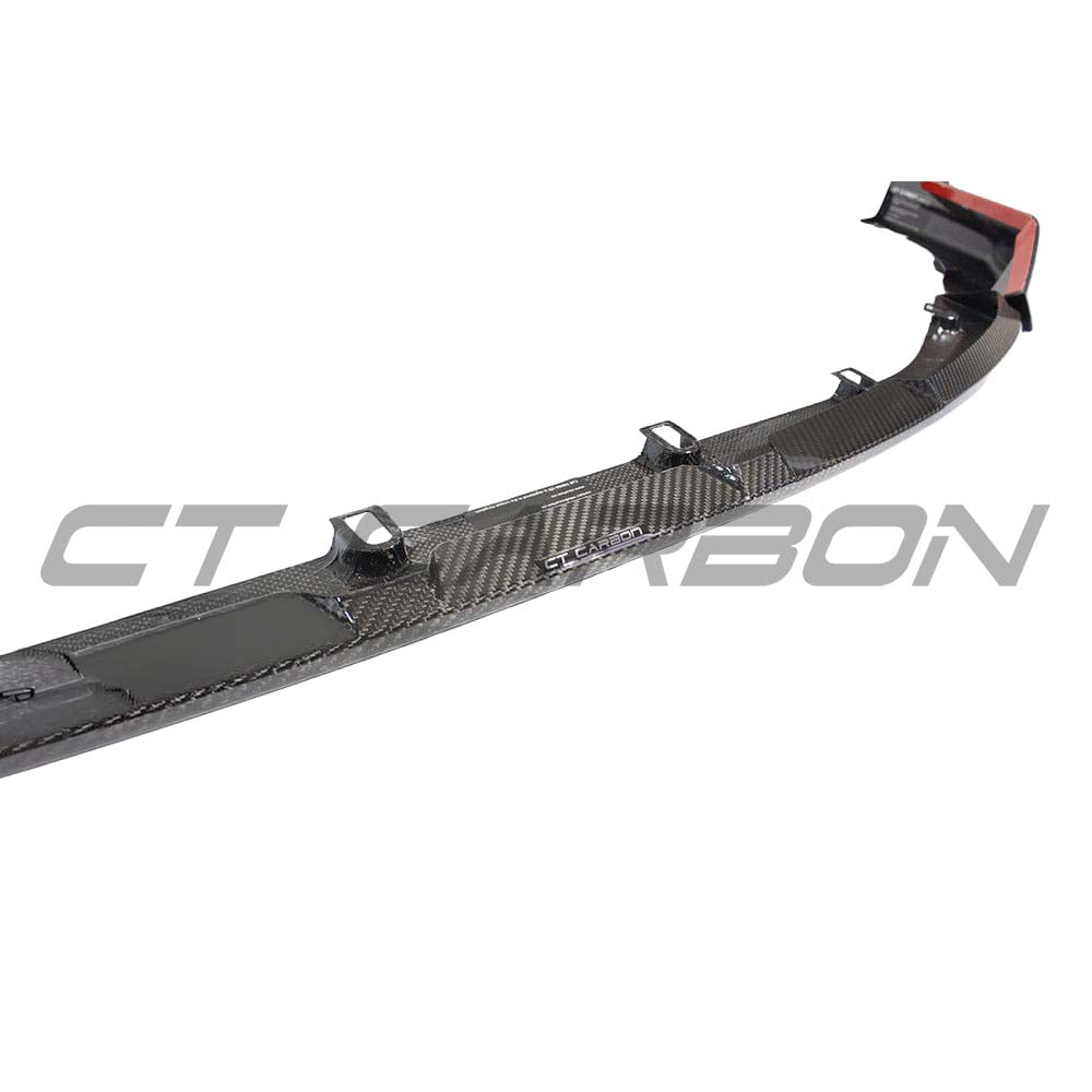 BMW M3 M4 G80 G82 G83 carbon fiber front end pack by CT Carbon, featuring sporty splitter and aerodynamic design.