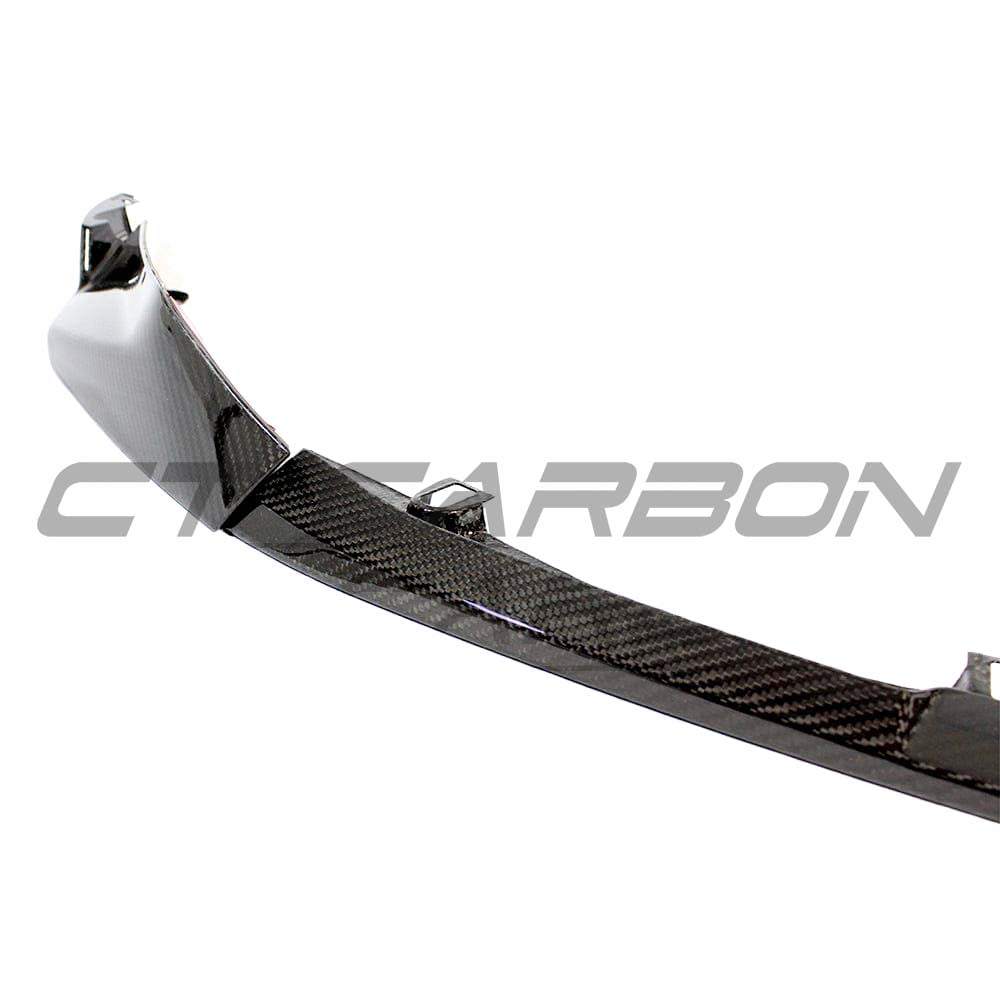 BMW M3 M4 G80 G82 carbon fibre front end pack by CT Carbon, featuring sleek splitter and performance-enhancing design.