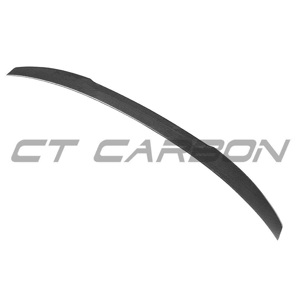BMW G30 5 Series 2016-2023 CT Carbon V6 kit with carbon fiber spoiler and body parts, M4 style, on vehicle.