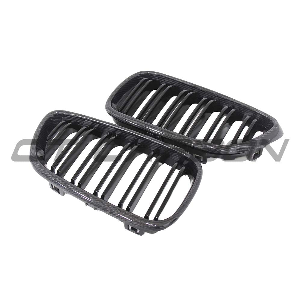 BMW M2 and 2 Series F87/F22 carbon fiber grille by CT Carbon, featuring sleek, textured carbon fiber design on the grille.