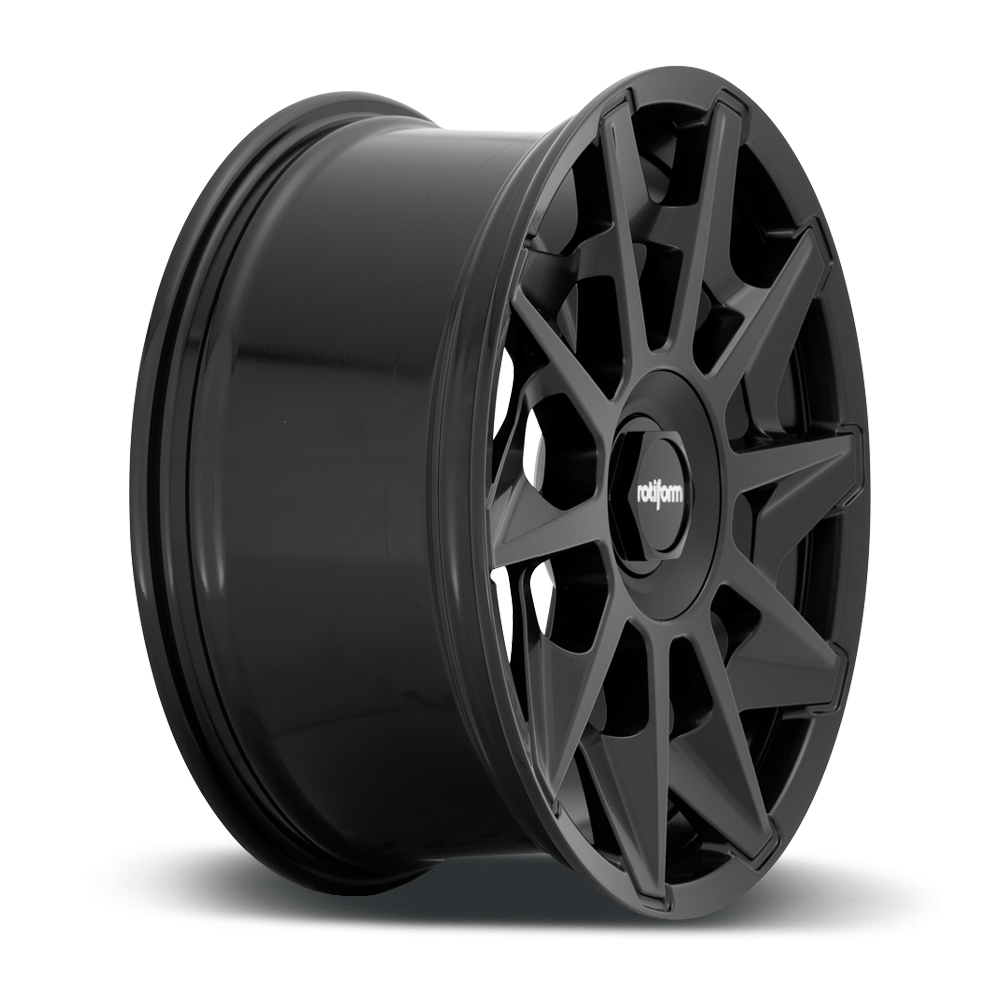 Rotiform CVT black, matte anthracite, and silver alloy wheels with a multi-spoke design on a car.