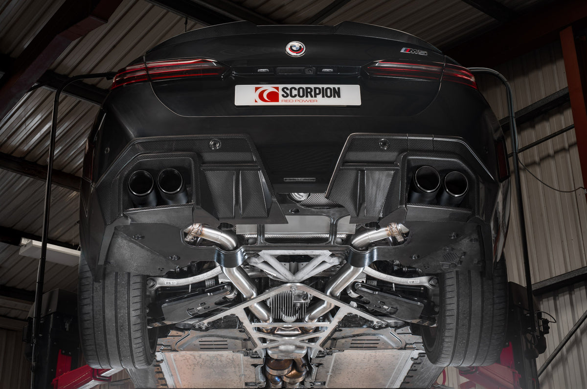 Scorpion BMW M5 G90 G99 GPF-Back Exhaust System with electronic valves, showcasing polished metal pipes and dual exhaust tips.