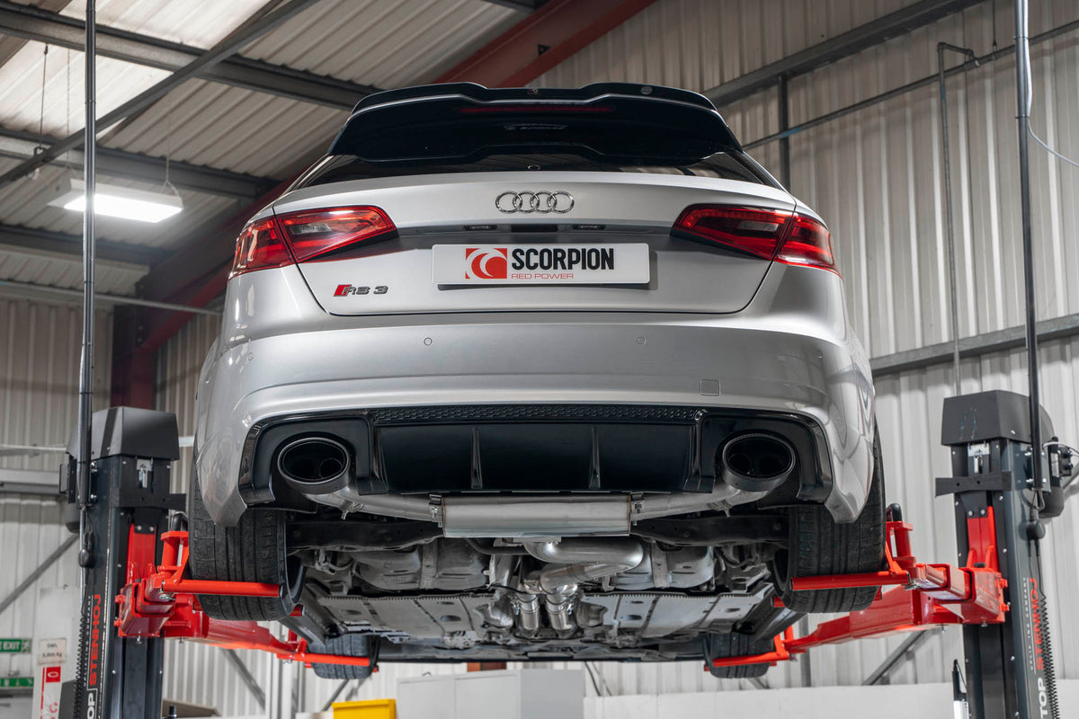 Scorpion Audi RS3 8V pre-facelift non-resonated cat-back exhaust system with valves, showcasing polished metal pipes and mufflers.