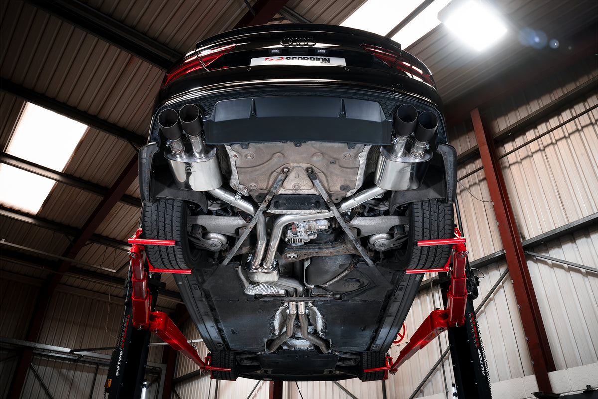 Scorpion Audi S6/S7 C7 resonated half exhaust system with electronic valves, showcasing polished metal pipes and valve controls.