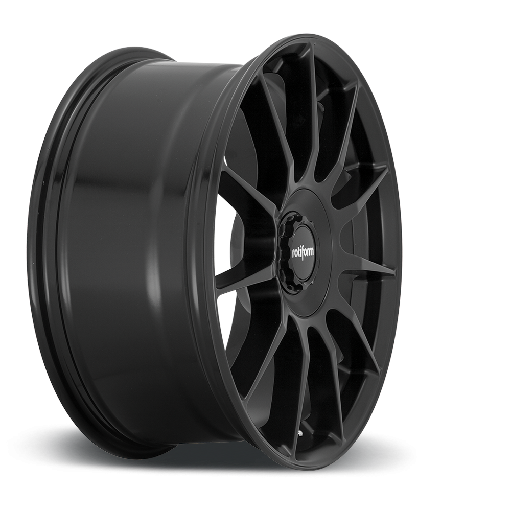 Rotiform DTM black and silver alloy wheels, 19-inch size with matte black finish and silver accents, shown from a side angle.