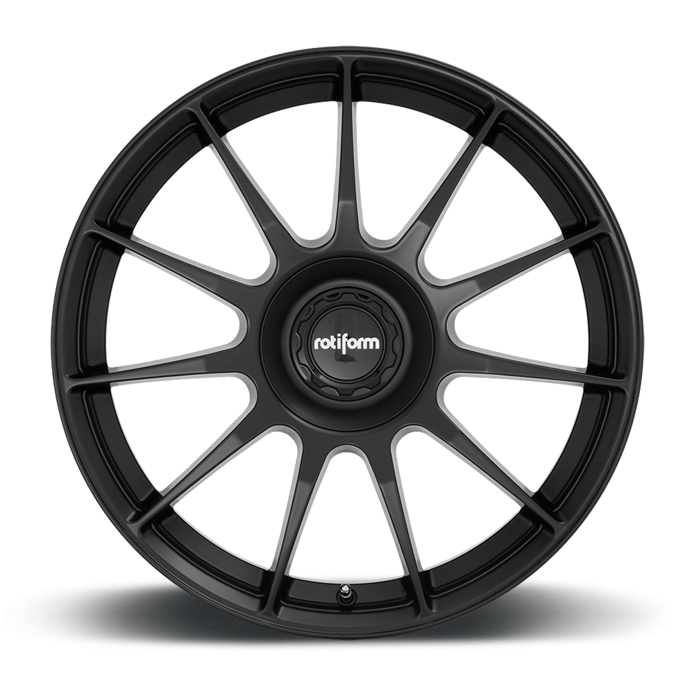Rotiform DTM black and silver alloy wheels with 19-inch size, matte black face, and silver accents, showing a close-up of the wheel design.