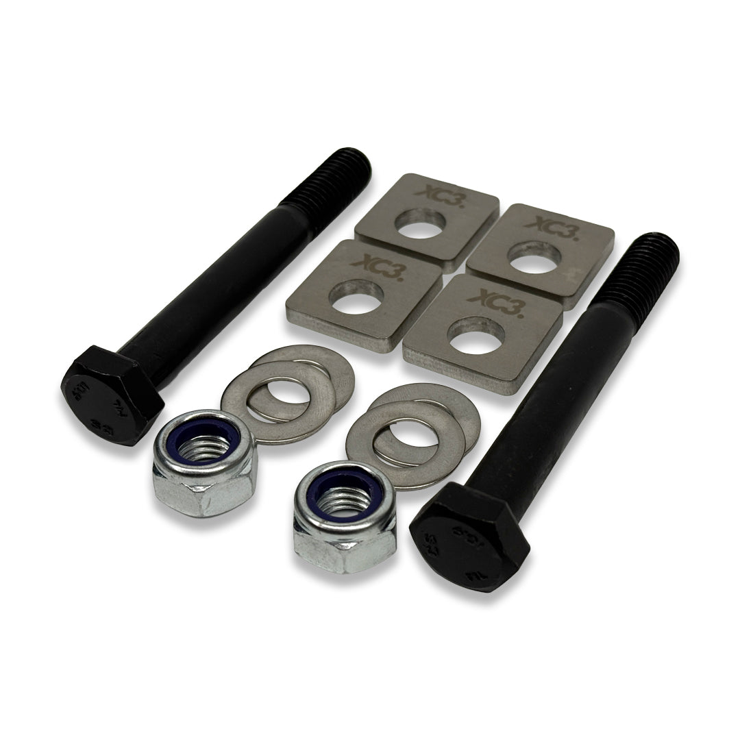 BMW M2, M3, M4 rear camber lockout shims from XC3 Engineering, showing close-up of adjustable suspension components.
