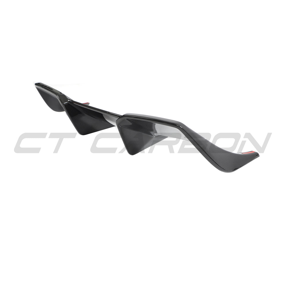 Ferrari 812 Superfast carbon fibre diffuser by CT Design, showcasing sleek carbon fibre details and aerodynamic design.