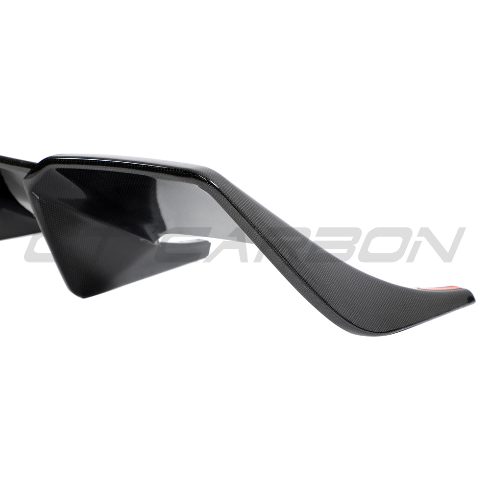 Ferrari 812 Superfast carbon fibre diffuser by CT Carbon, showcasing sleek aerodynamic design and glossy black finish.
