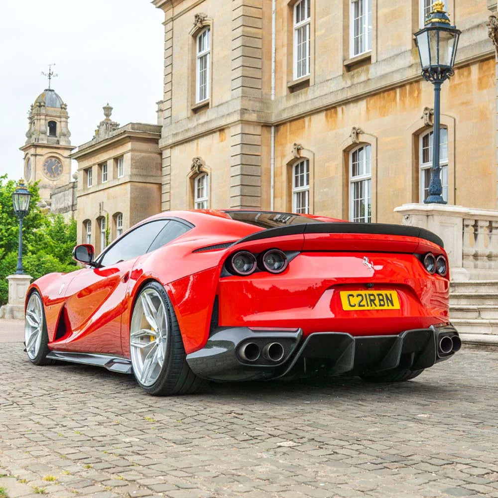 Carbon fiber diffuser for Ferrari 812 Superfast by CT Carbon, showcasing sleek aerodynamic design and high-quality material.