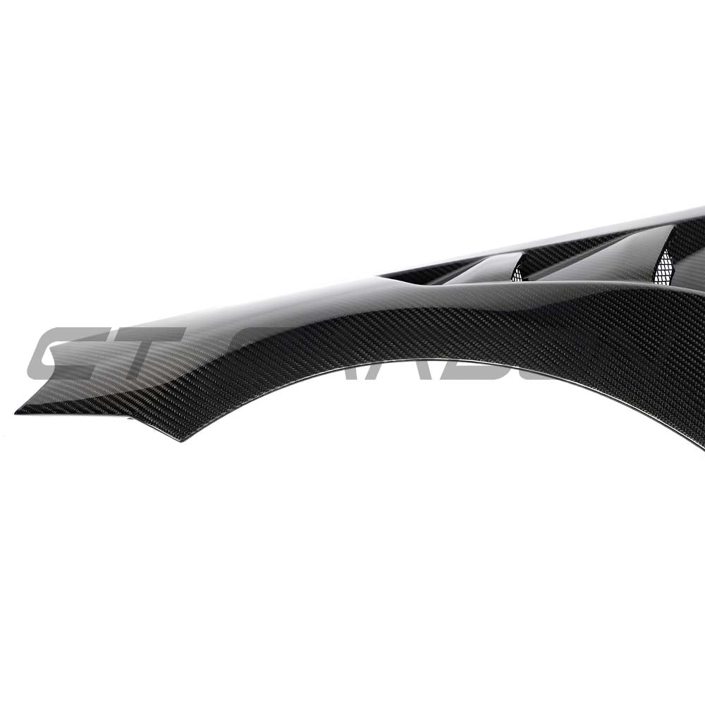BMW G87 M2 front end pack featuring carbon fiber bonnet and fender kit by CT Carbon, showcasing sleek, lightweight aerodynamic parts.