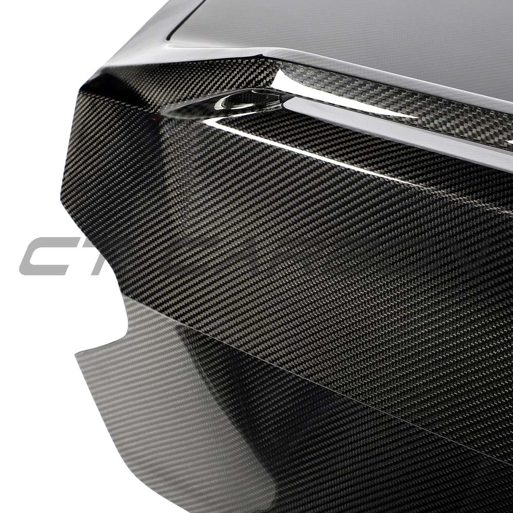 BMW G87 M2 CT Carbon full car conversion kit featuring carbon fiber components on a sleek, sporty vehicle.