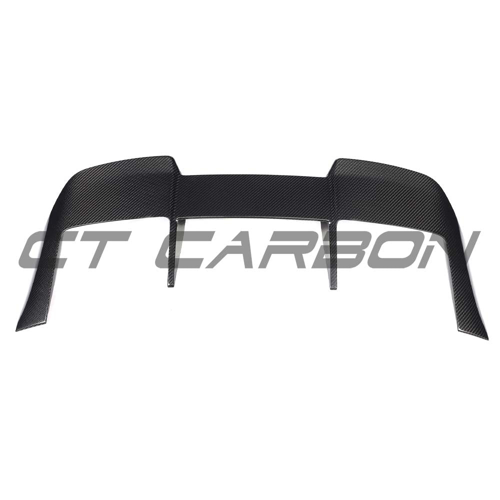 BMW G99 M5 Touring 2024 carbon fibre spoiler by CT Carbon, showing the sleek, aerodynamic design mounted on the vehicle.