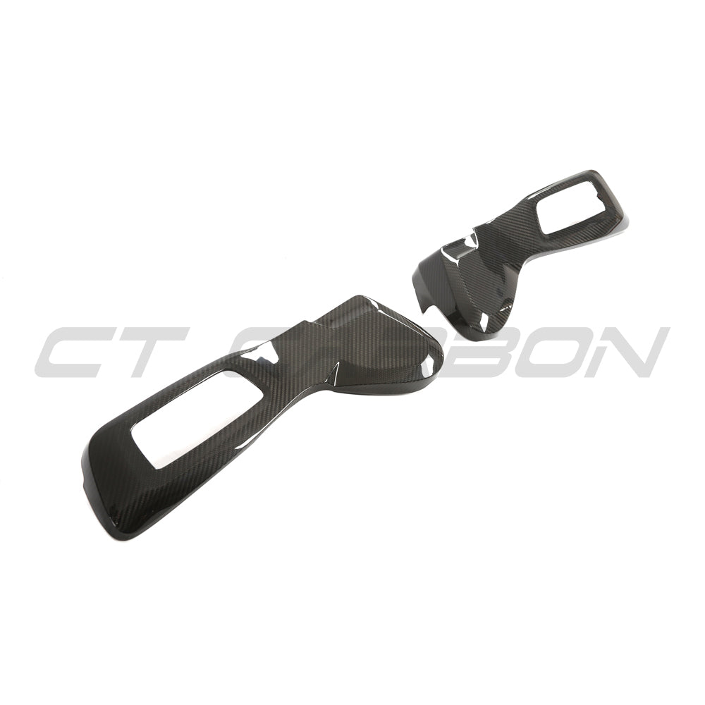 BMW G42 2 Series 2022+ carbon fibre seat control cover by CT Carbon, showing the sleek, textured carbon fiber design on the accessory.