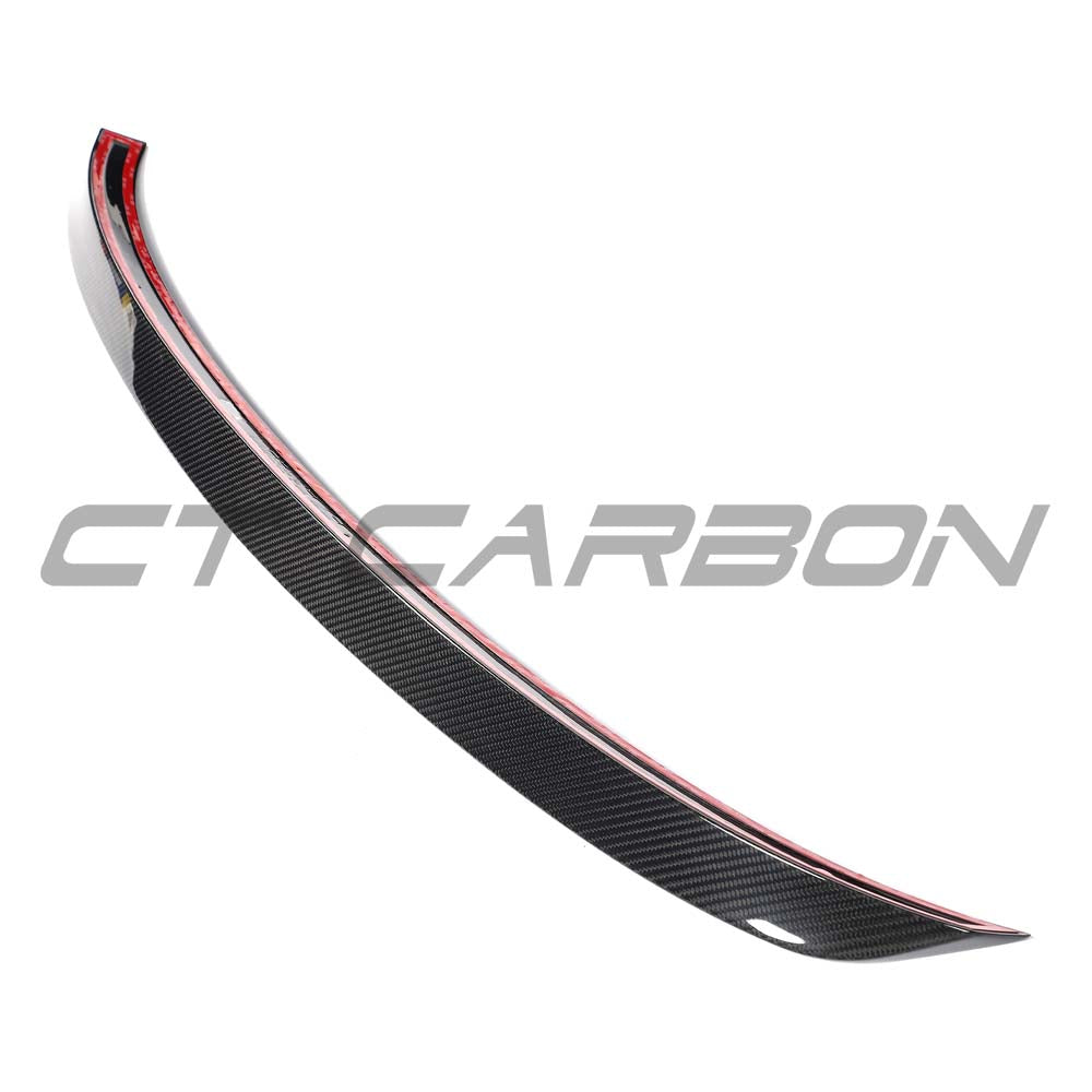 Audi RS6 C8 Avant carbon fiber middle spoiler by CT Carbon, showing the sleek, aerodynamic design on the car's rear.
