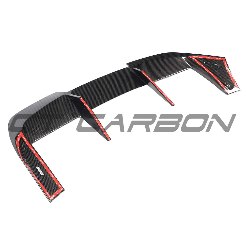 BMW G99 M5 Touring 2024 carbon fibre spoiler by CT Carbon, showing sleek aerodynamic design on the car's rear edge.