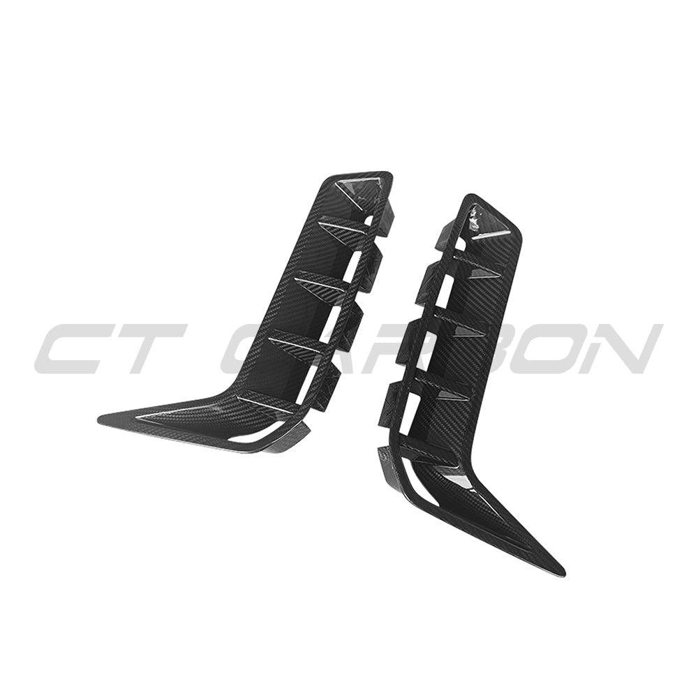 BMW G05 X5 LCI 2024+ carbon fibre front vent add-on by CT Carbon, showcasing sleek, textured carbon fiber finish on the vehicle's front.