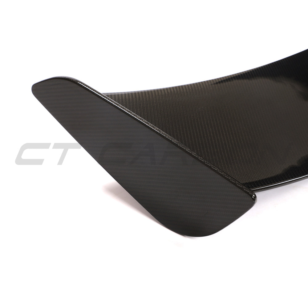 MCLAREN 570S full carbon fiber kit from CT Carbon, featuring a sleek carbon fiber wing spoiler on a sports car.