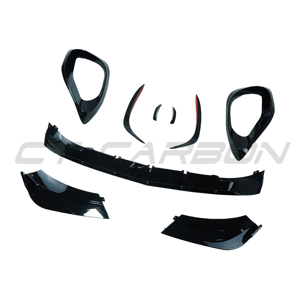 Gloss black front end trim pack for Mercedes W206 C-Class 2021+ by CT Carbon, featuring a sleek splitter design.