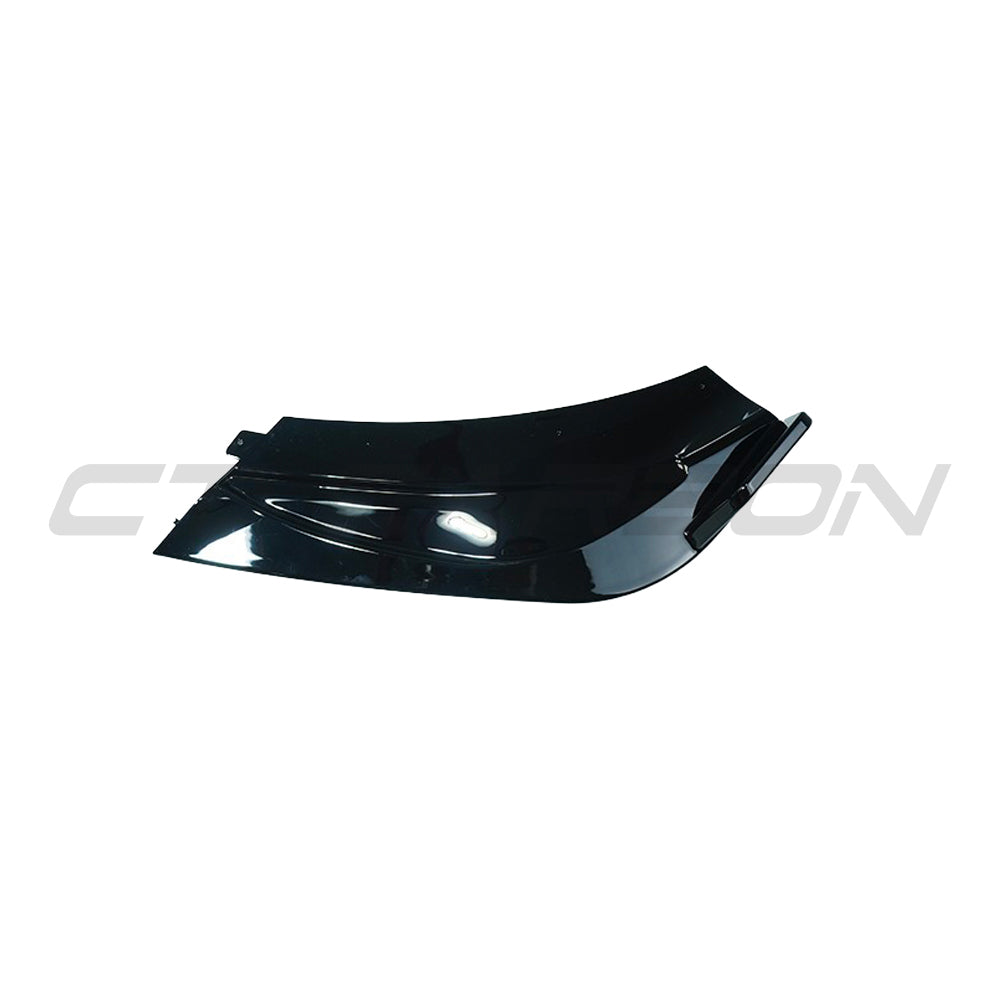 Mercedes W206 2021+ C-Class CT Carbon gloss black front end trim splitter showing a sleek, aerodynamic design on the vehicle.