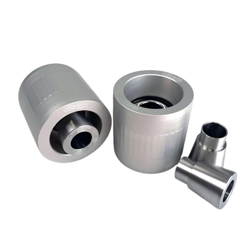 Millway Motorsport rear inner lower uniball bushings for BMW F8X, G8X M2/M3/M4, E9X M3, E82 1M, showing close-up of bushings in vehicle suspension.