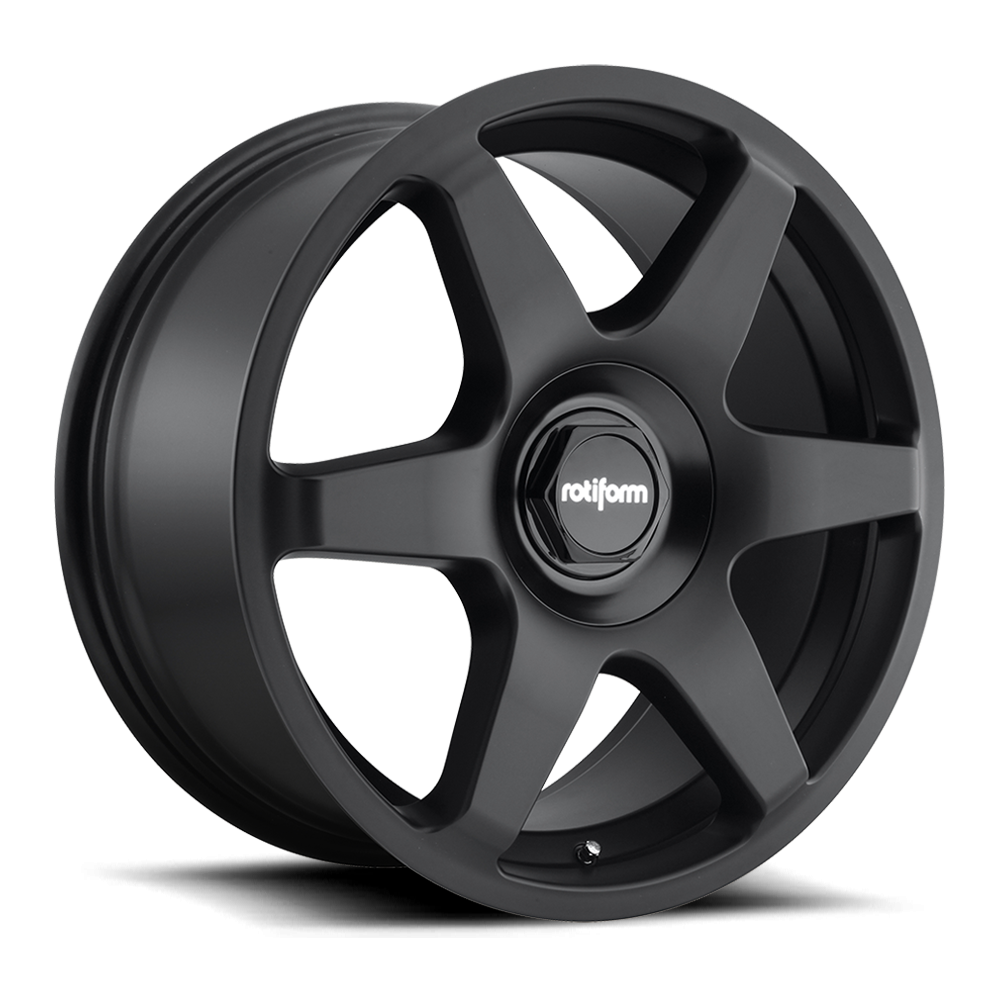 Rotiform SIX black and silver alloy wheels with a multi-spoke design, shown on a vehicle for a stylish, modern appearance.