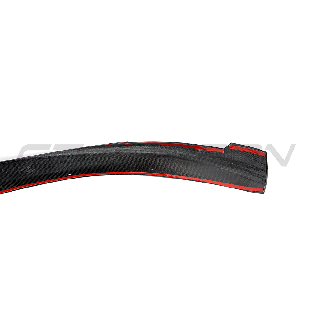 CT Carbon Porsche Taycan 2020-2024 carbon fibre splitter, close-up view showing sleek aerodynamic design and textured finish.