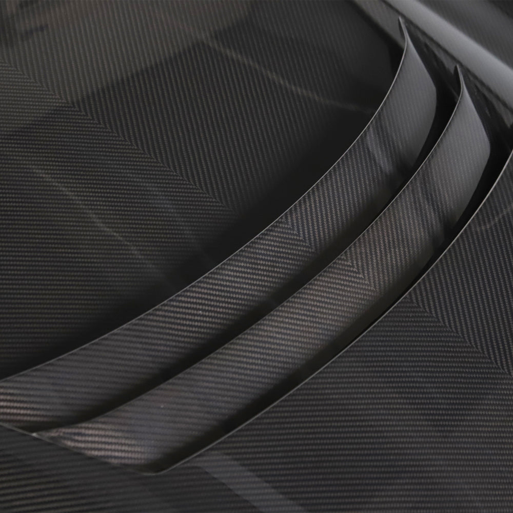 Toyota Supra 2019+ A90 CT Carbon carbon fiber front hood, close-up showing sleek design and textured material.