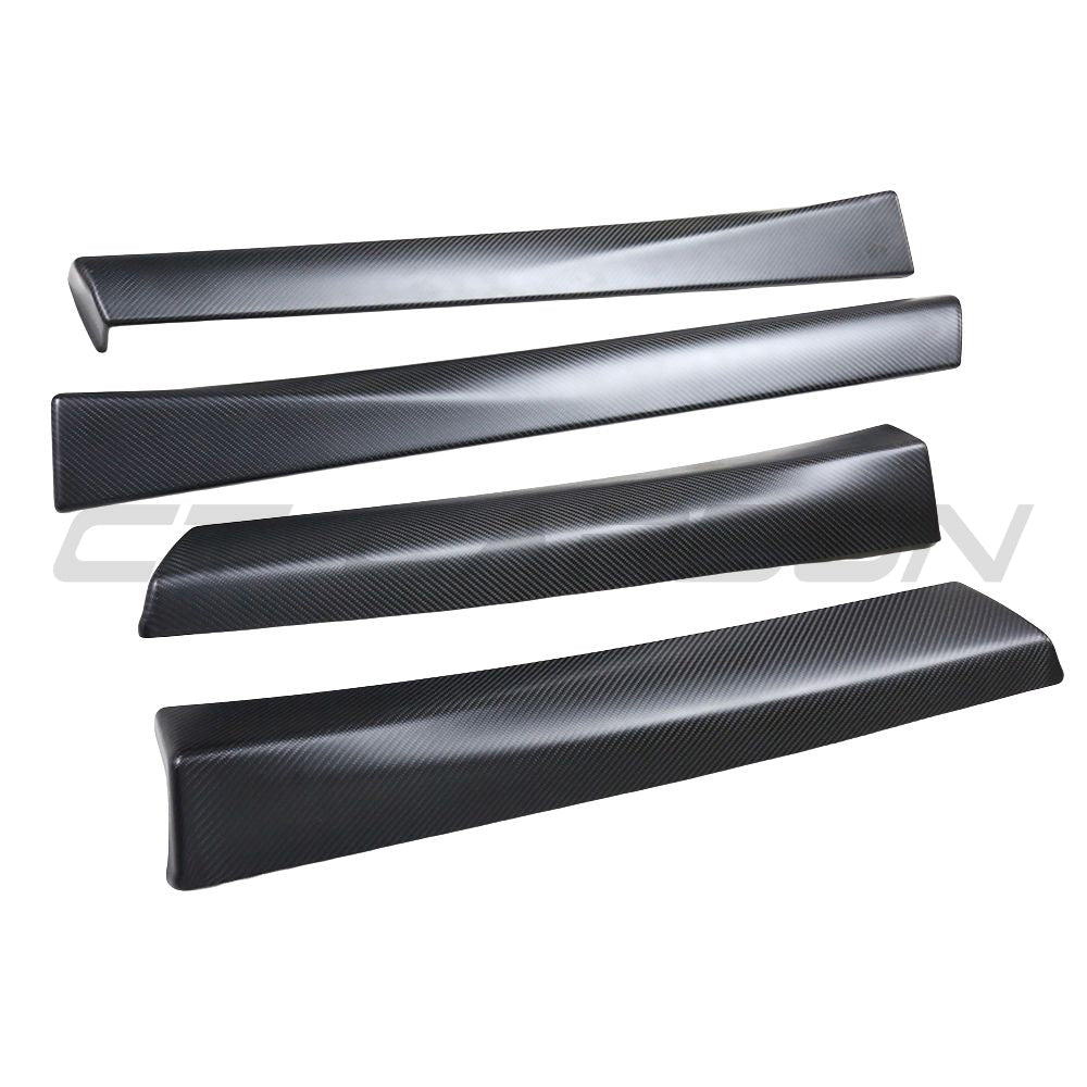 Tesla Model 3 2017-2023 carbon fibre interior door panel trim accessory by CT Carbon, showing close-up of sleek black finish.