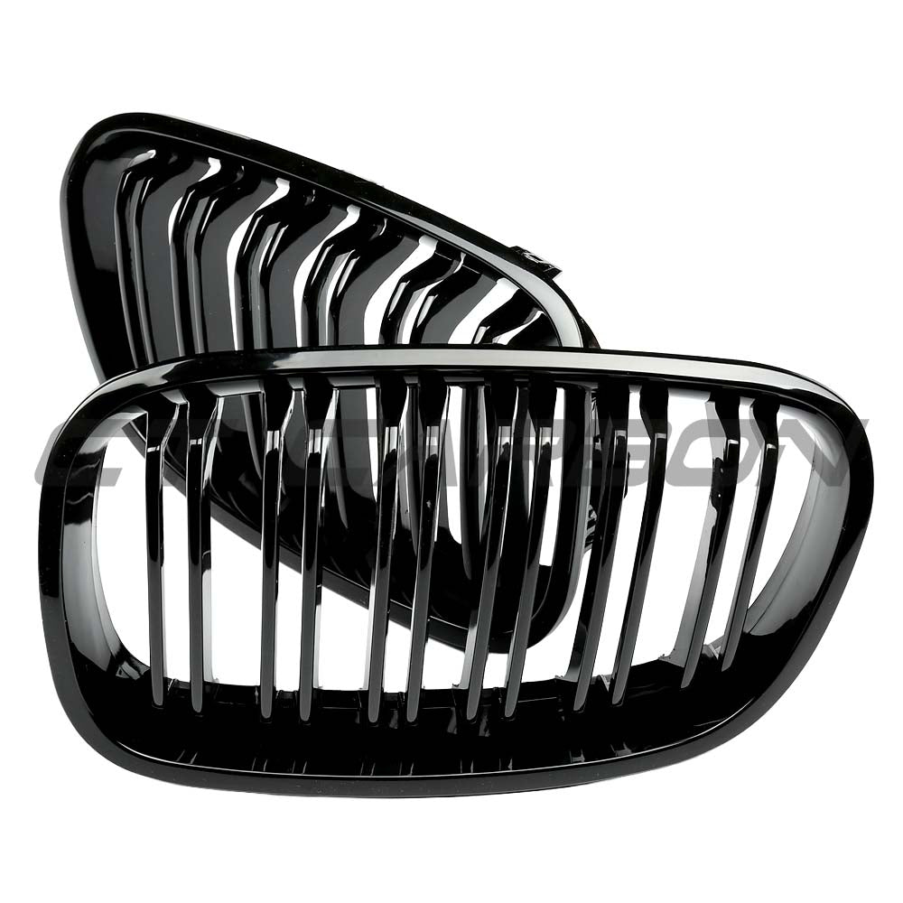 BMW F20 1 Series 2011-2019 CT Carbon gloss black grille with dual slats, close-up view of the automotive front grille.