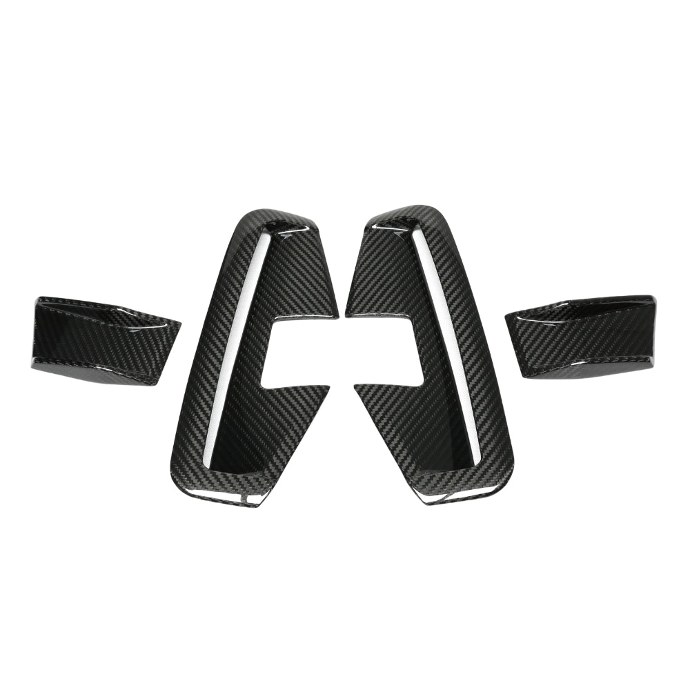 BMW 4 Series G22/G23 carbon fiber vent accessories set by CT Carbon, featuring four sleek vent pieces for enhanced style.