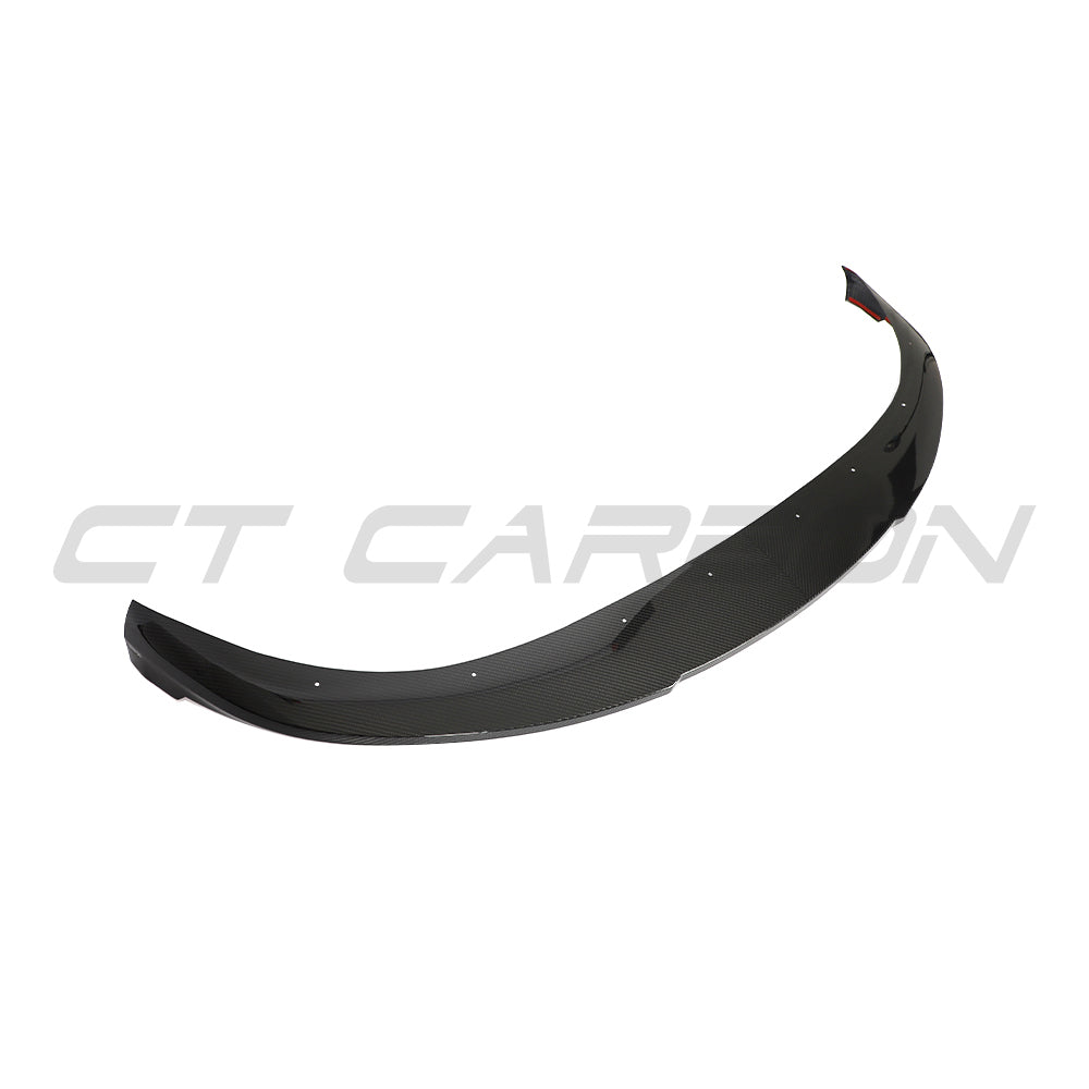 CT Carbon Porsche Taycan carbon fibre splitter mounted on the front bumper, showcasing sleek aerodynamic design.