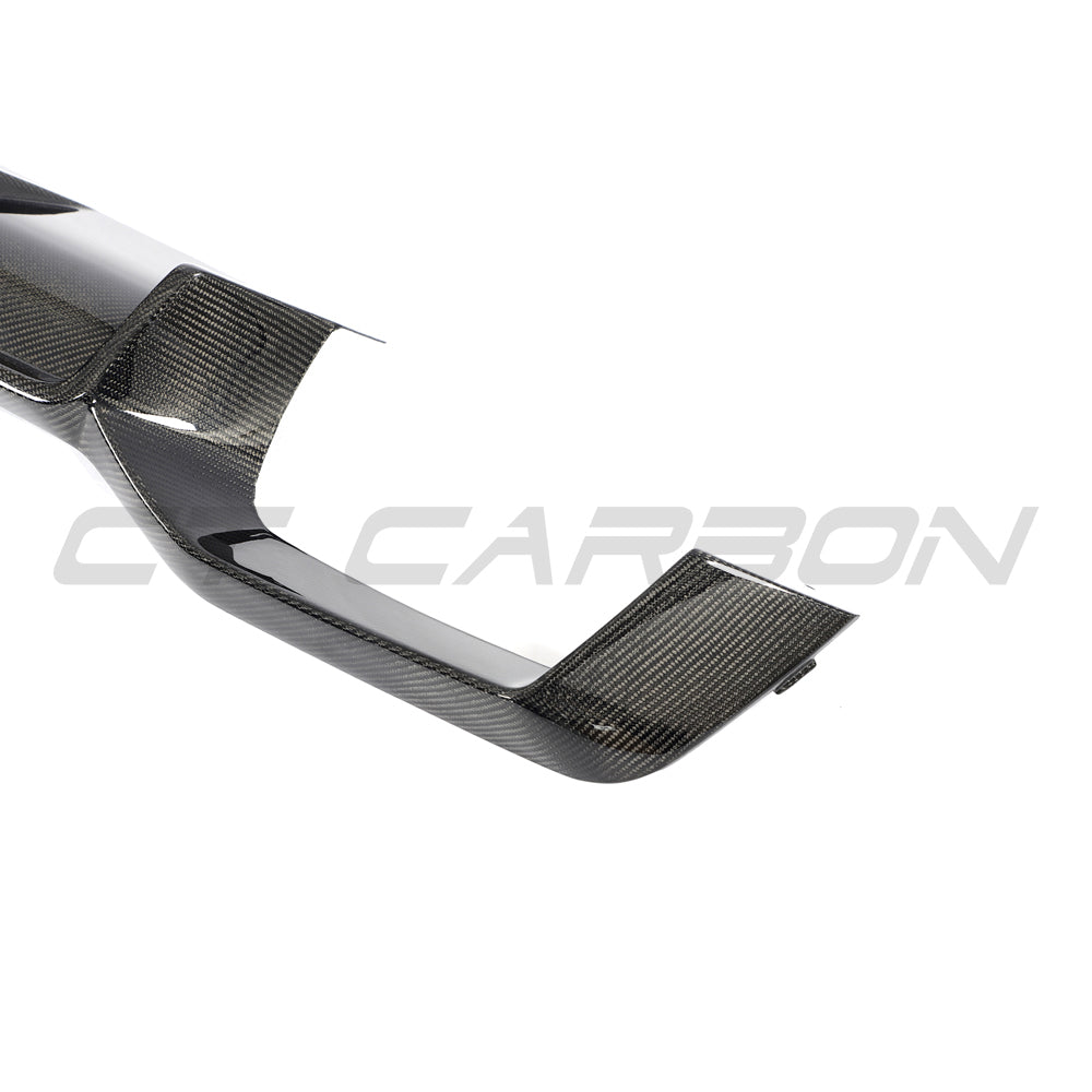 BMW G02 X4 and F98 X4M LCI 2022-2025 CT Carbon carbon fiber diffuser installed on the rear of the vehicle.