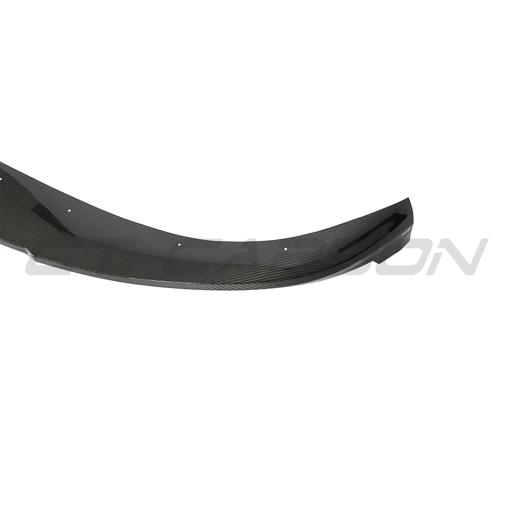 CT Carbon Porsche Taycan 2020-2024 carbon fiber splitter installed on front bumper, showcasing sleek aerodynamic design