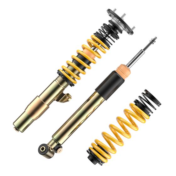 ST Suspension XTA PLUS coilovers with adjustable damping and top mounts for BMW E92/E90 M3, shown installed on vehicle.