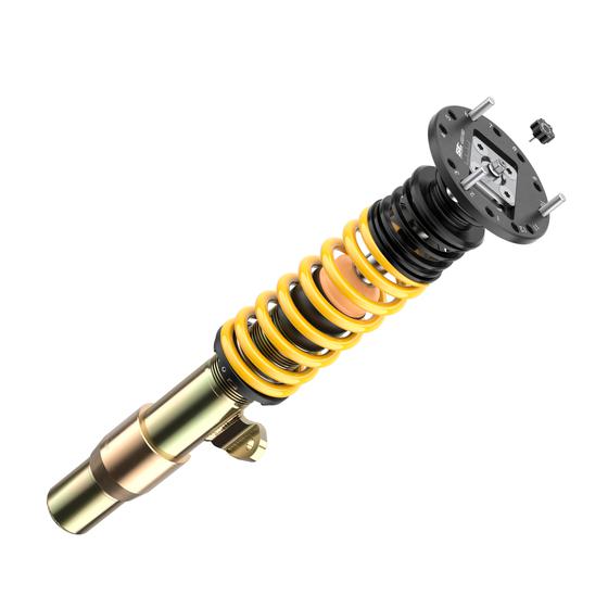 ST Suspension ST XTA PLUS coilovers with adjustable damping and top mounts installed on a BMW E92 M3, showing the vehicle's suspension setup.