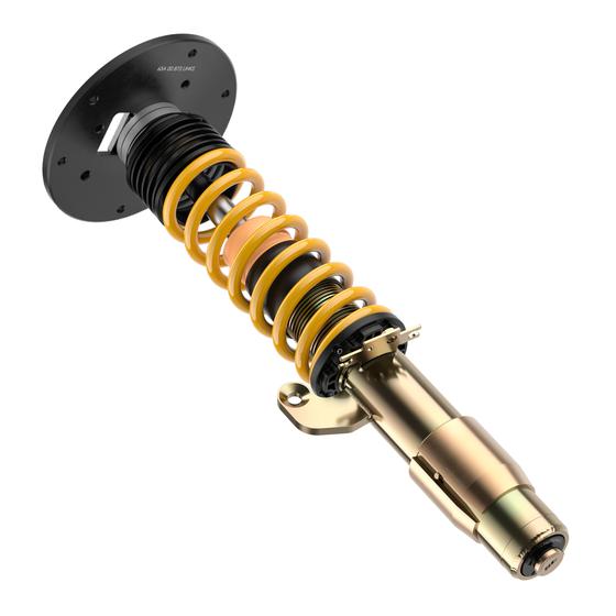 ST Suspension ST XTA PLUS coilovers for BMW F80 M3, F82 M4, F83 M4 with adjustable damping and top mounts, close-up view.