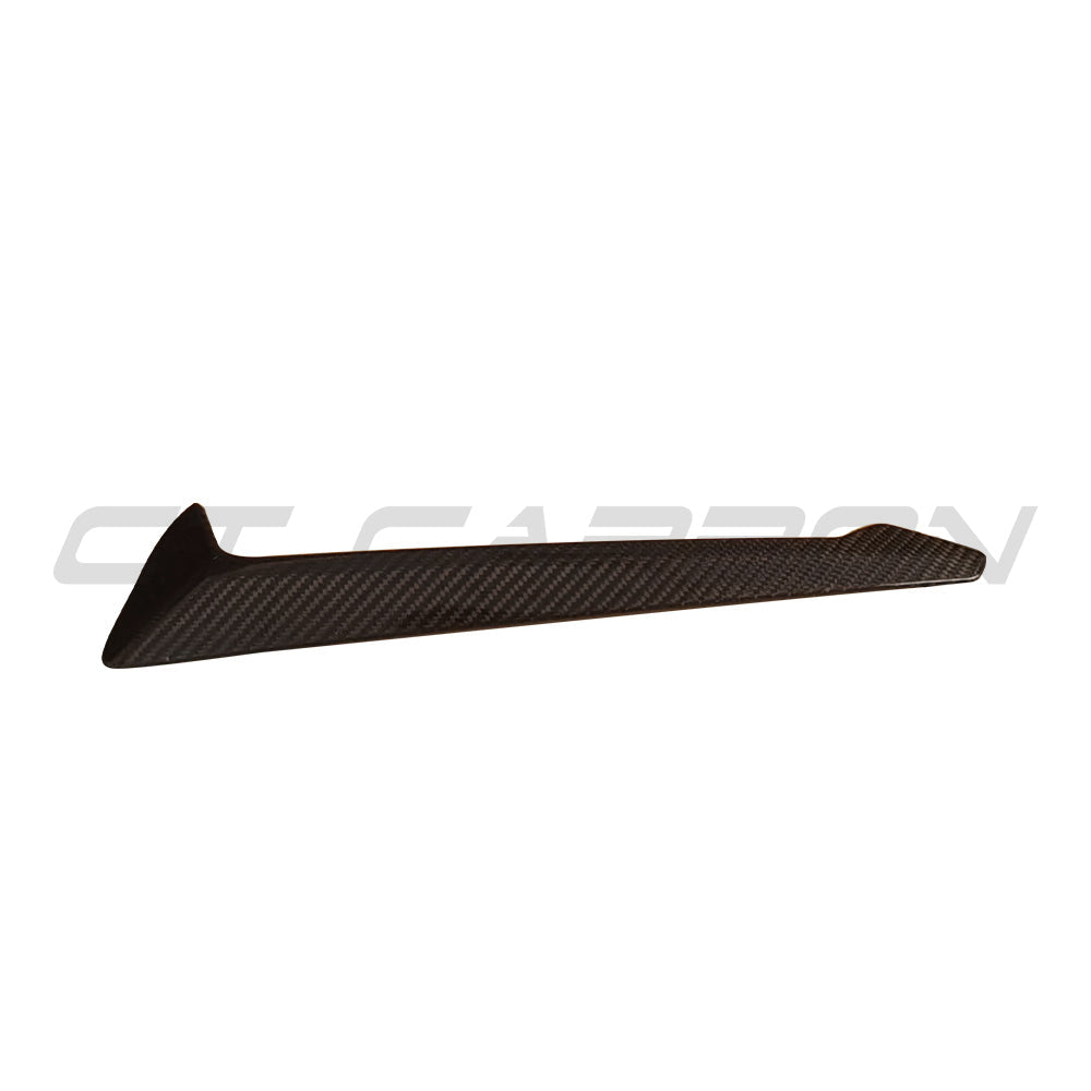 BMW G05 X5 2019-2023 carbon fiber fender trim add-on by CT Carbon, showcasing sleek, lightweight automotive accessory details.