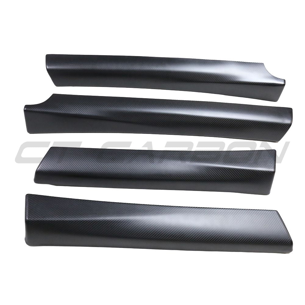 Tesla Model 3 2017-2023 carbon fiber interior door panel trim accessories by CT Carbon, showing sleek, textured carbon fiber surface.