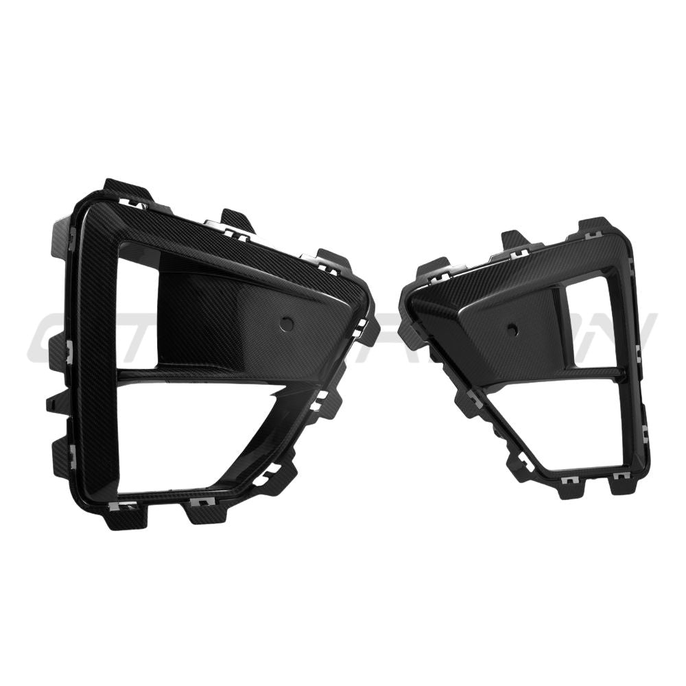 Carbon fiber front bumper trim for BMW X5M LCI 2023+ by CT Carbon, showcasing sleek, textured automotive accessory detail.