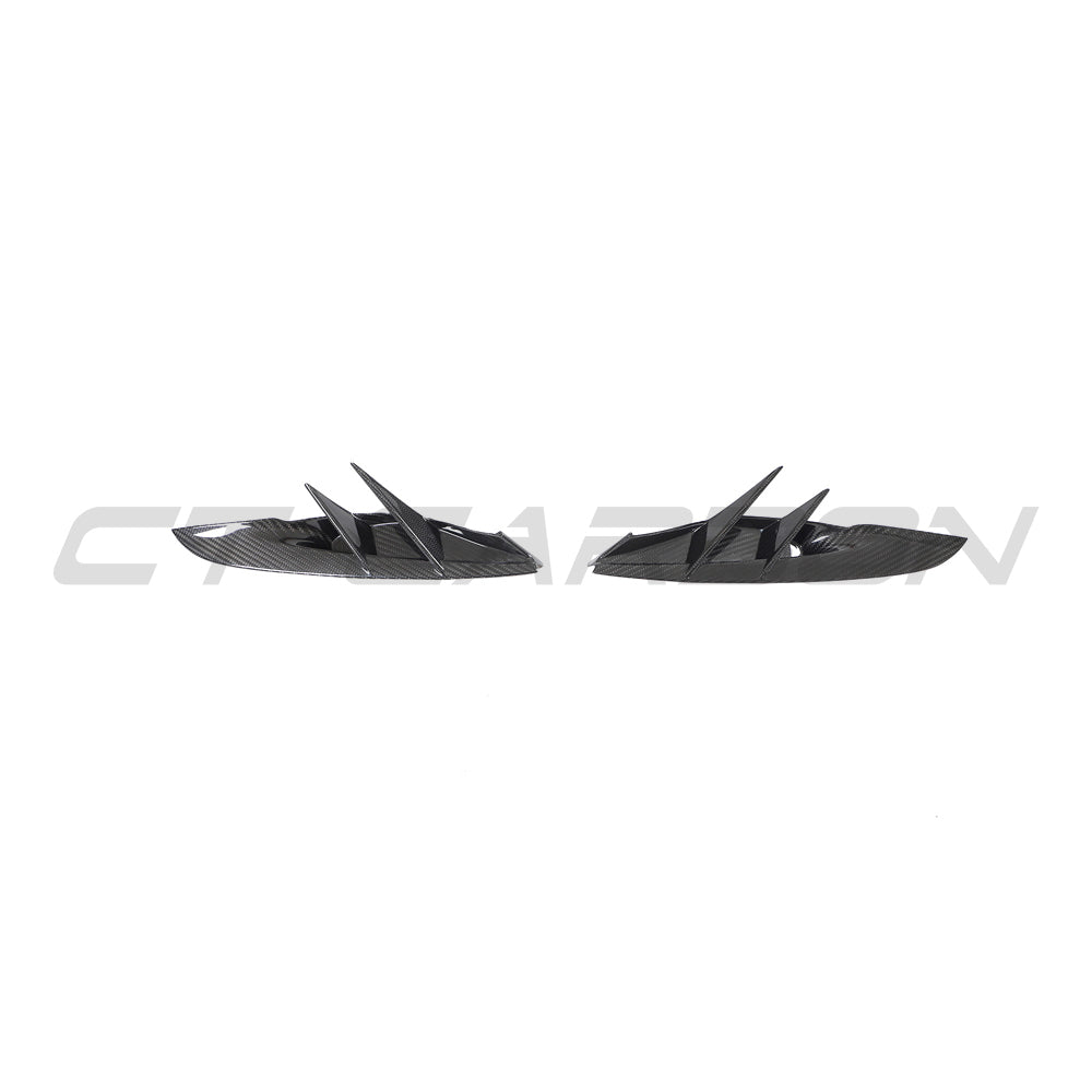 Carbon fiber front bumper vent trim for Toyota Supra 2019+ A90 by CT Carbon, shown on the vehicle's front bumper.