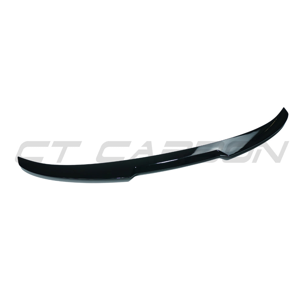 BMW 5 Series F10 2011-2017 CT Carbon gloss black spoiler installed on the rear of the vehicle.
