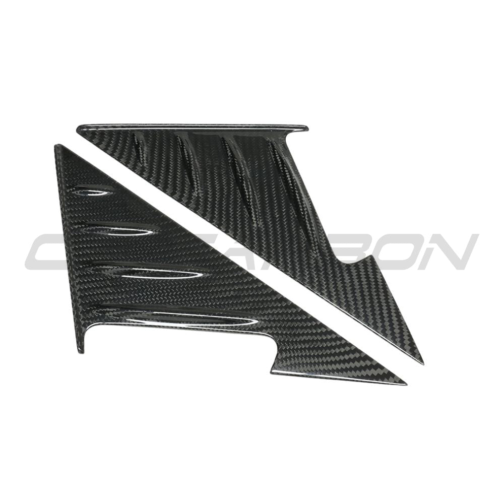 BMW G87 M2 2023 dry carbon fibre mirror pillar trim accessory by CT Carbon, showing close-up of sleek black carbon finish.