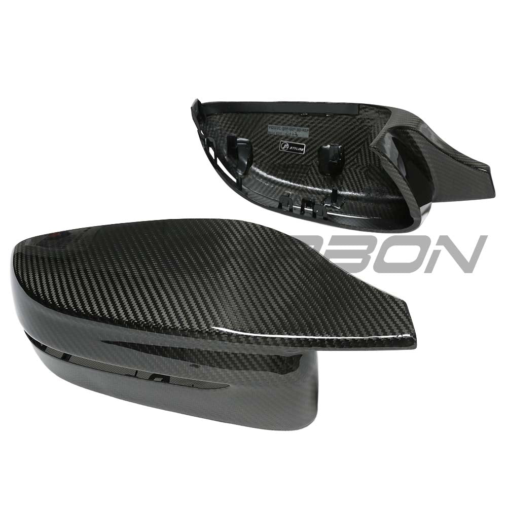 BMW G14/G15/G16 8 Series RHD dry carbon fibre mirror cover replacements by CT Carbon, showing sleek, textured mirror covers.