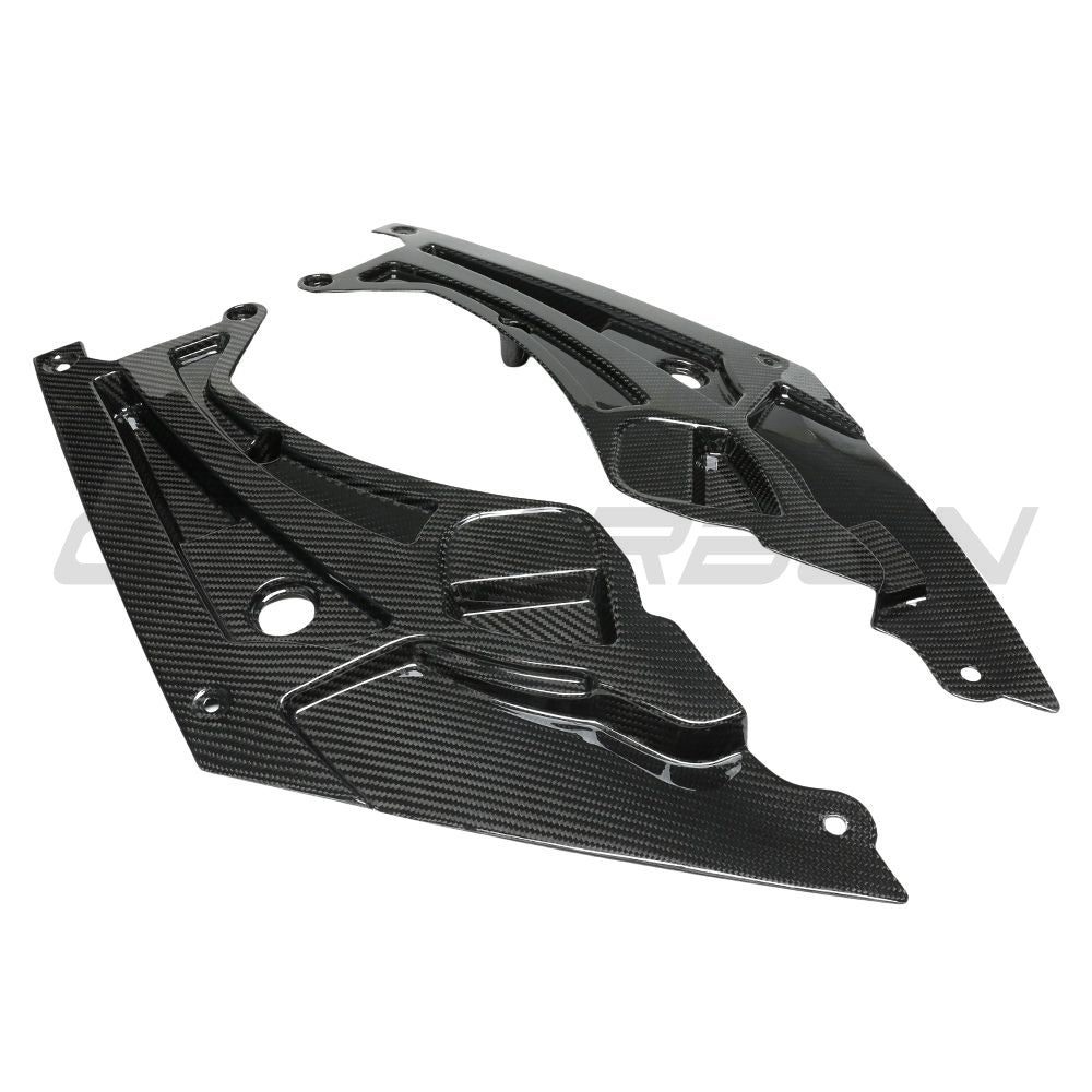 BMW M3 M4 G80 G82 carbon fiber headlight cover accessory by CT Carbon, showing sleek black carbon fiber design on car headlights.