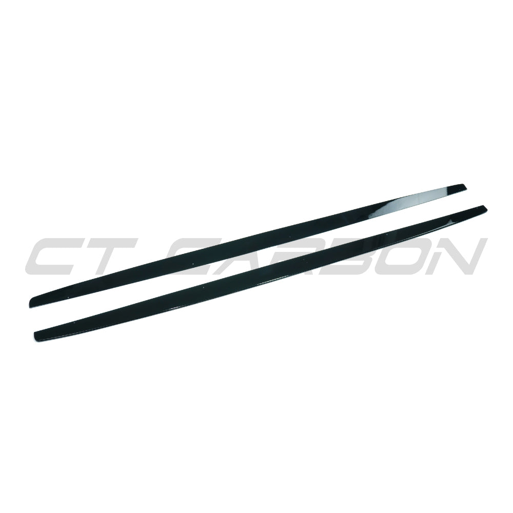 BMW 1 Series E82/E83/E87/E88 2004-2013 CT Carbon gloss black side skirts installed on vehicle.
